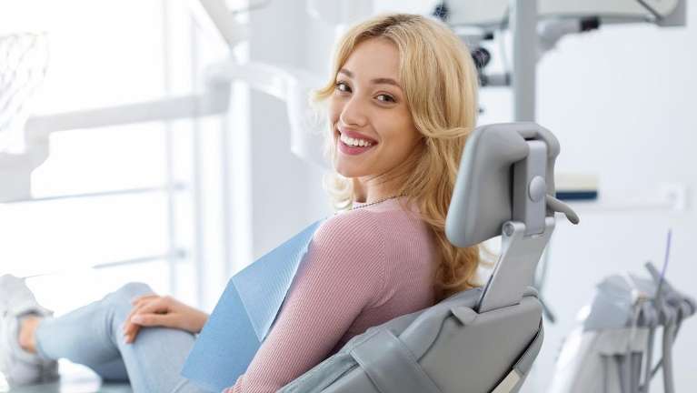 woman sitting in a dental chair