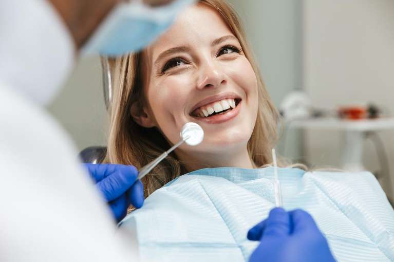 woman getting dental cleanings